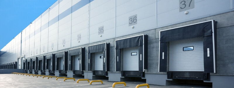 a building with rows of loading docks