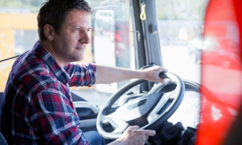 man driving a vehicle